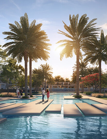 Gehobene Outdoor-Anlage in Mirage at the Oasis von Emaar, Dubailand. Die exklusive Wohnanlage bietet eine atemberaubende Wasserlandschaft mit stilvollen Gehwegen, umgeben von majestätischen Palmen und üppiger Vegetation. Bewohner genießen eine ruhige und elegante Atmosphäre mit hochwertigen Annehmlichkeiten inmitten einer grünen Oase. Perfekt für anspruchsvolle Käufer, die eine luxuriöse Immobilie in Dubai suchen. Jetzt auf nikvandamme.ae entdecken.